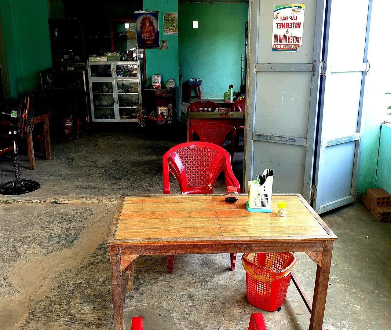 The entrance and interior of a vegetarian eatery near a temple in Cam Lộ, Vietnam
